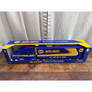 First Gear NAPA Auto Parts Lights and Sounds Race Car Transporter Truck With Box